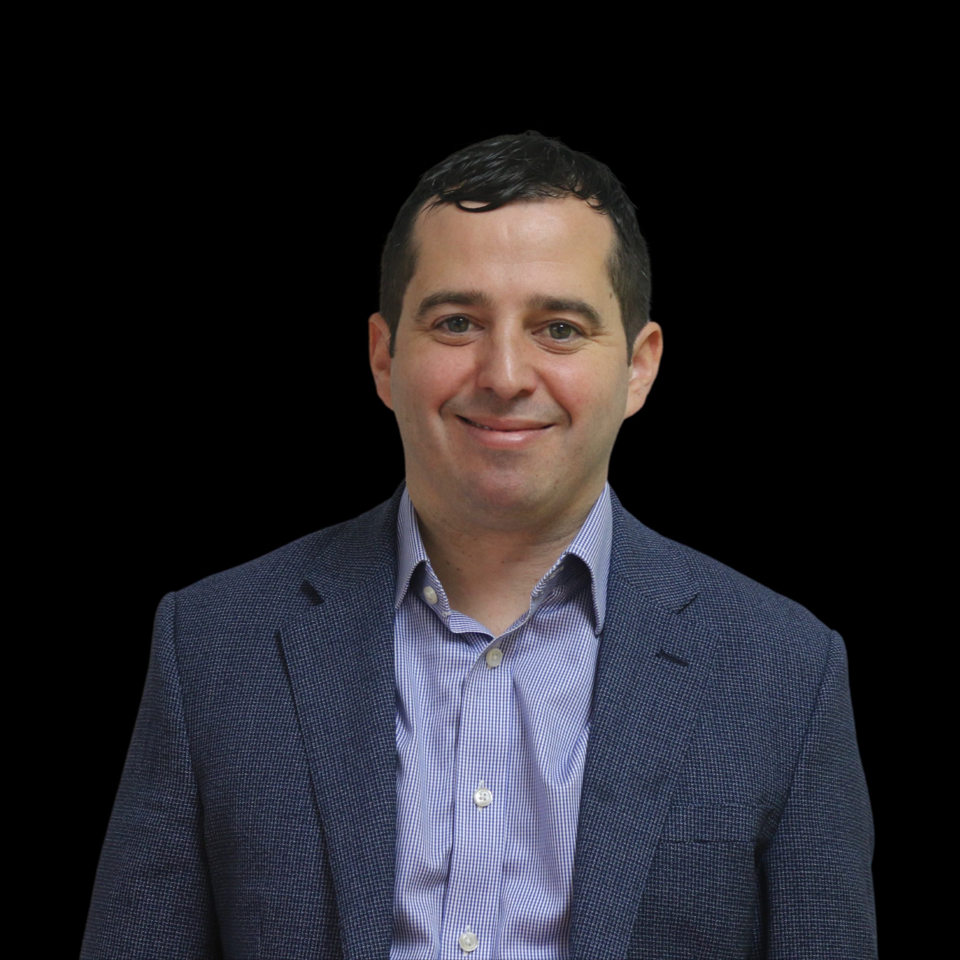 Smiling businessman on black background